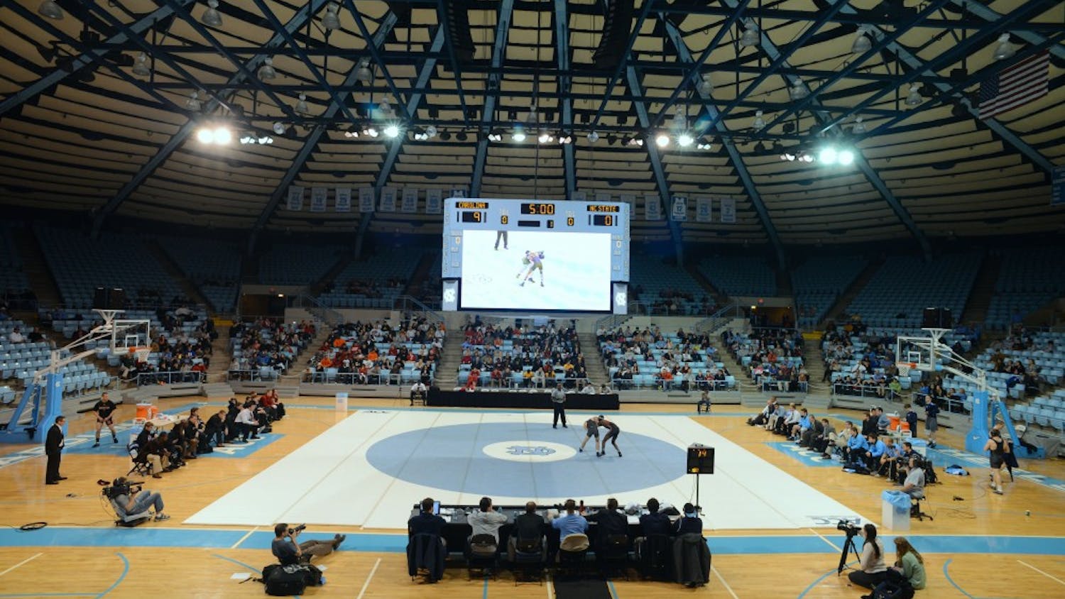 The UNC wrestling team competes in a match against N.C. State in Carmichael Arena on Feb. 1, 2023.&nbsp;