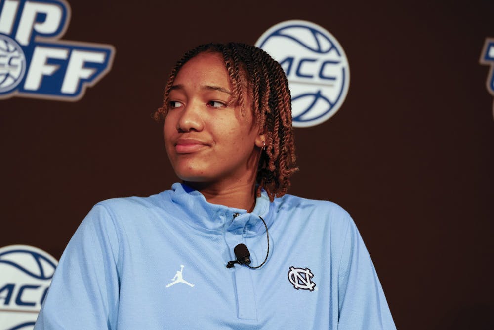 North Carolina's Kennedy Todd-Williams listens to a question at the 2022 ACC Tipoff in Charlotte, N.C., Tuesday, Oct. 11, 2022. (Photo by Nell Redmond/ACC)