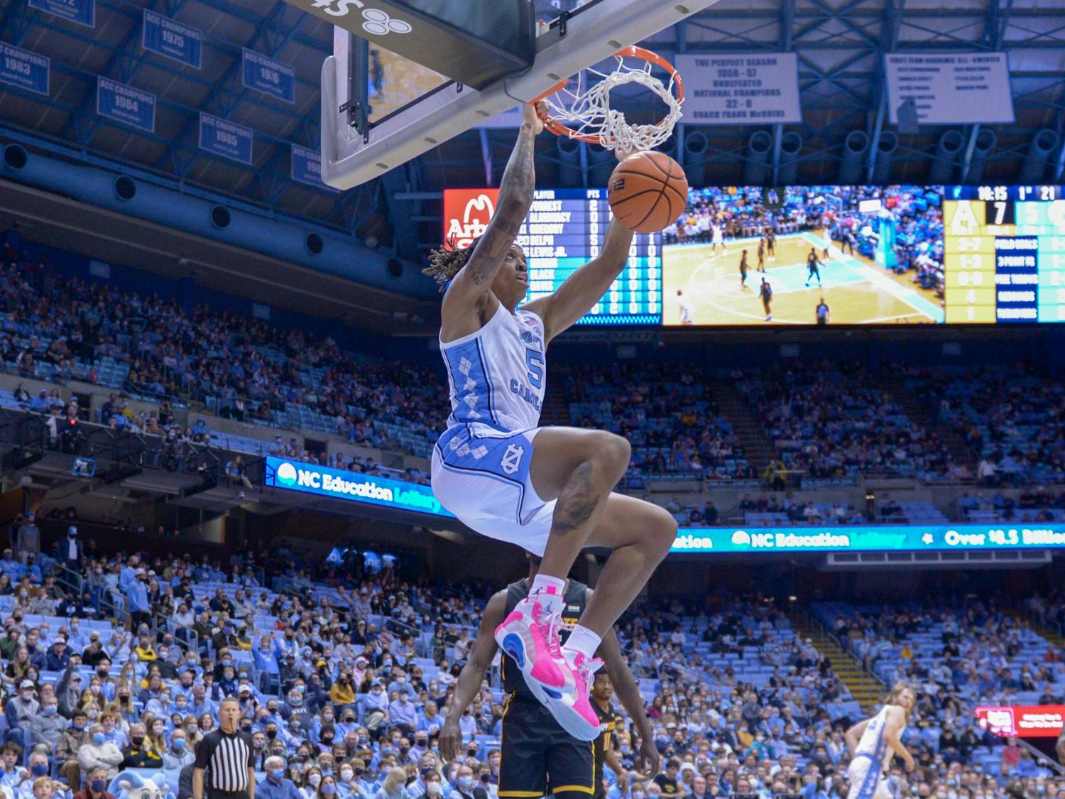 Junior forward/center Armando Bacot (5) scores a point against App State in the Dean E. Smith Center on Dec 21, 2021.