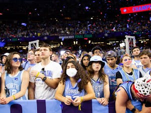 UNC students mourn a national championship loss to Kansas in New Orleans on Monday, April 4, 2022.