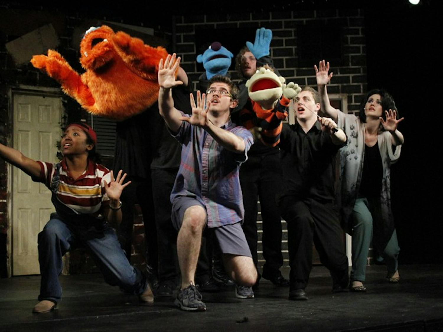 Student performers act out a musical scene during a dress rehearsal for Pauper Player's production of Avenue Q. The rehearsal took place at the Arts Center in Carrboro, Wednesday the 2nd of April.