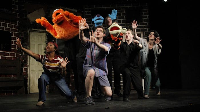 Student performers act out a musical scene during a dress rehearsal for Pauper Player's production of Avenue Q. The rehearsal took place at the Arts Center in Carrboro, Wednesday the 2nd of April.