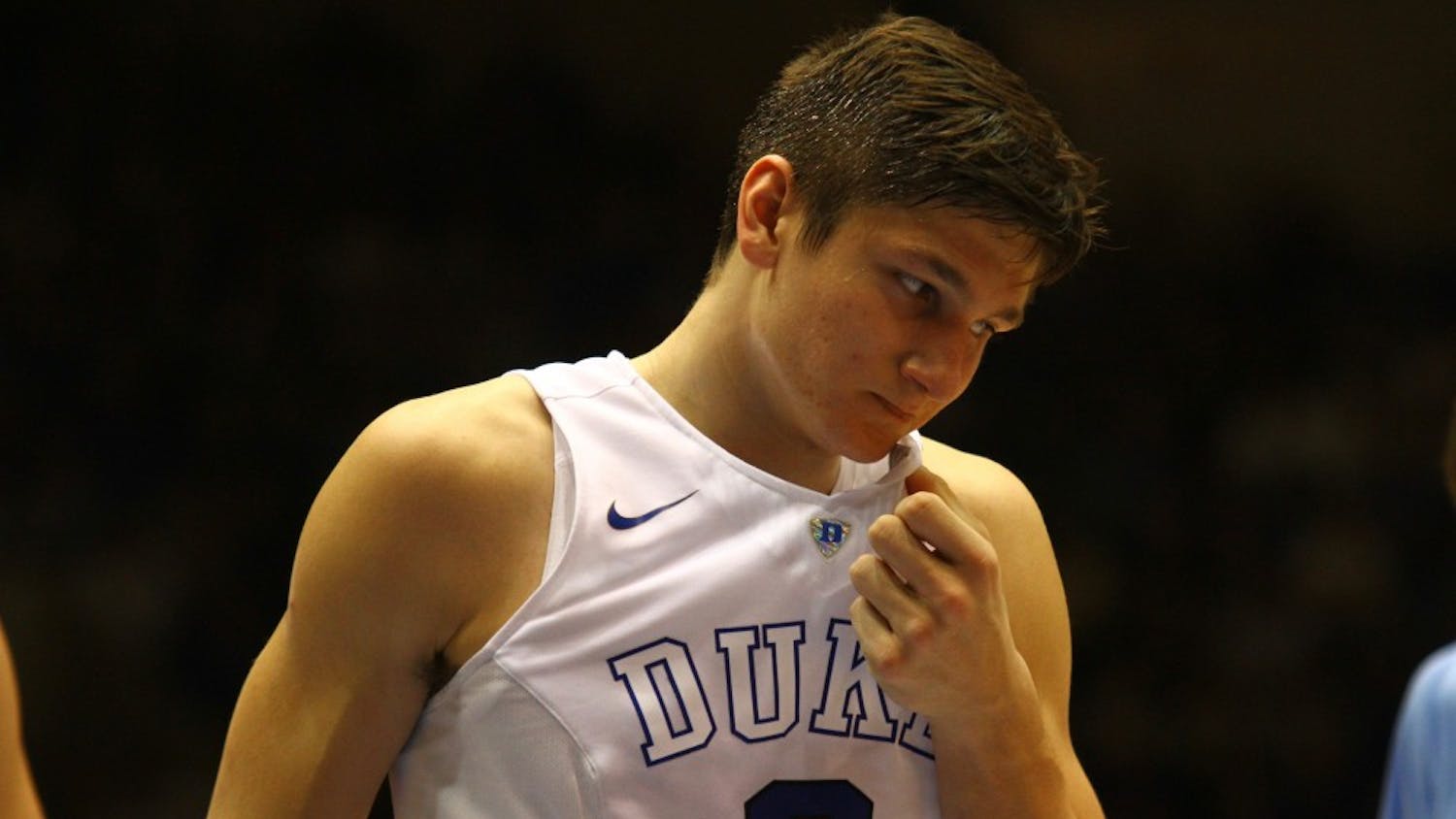 Grayson Allen wipes his face with his jersey during North Carolina's 76-72 victory over Duke.