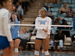 Redshirt first-year Lauren Harrison anticipates a serve in UNC Volleyball's 3-0 win over Duke Thursday.