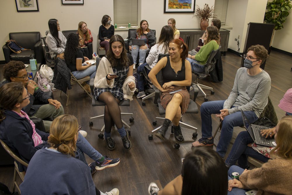<p>UNC Student Organization for Undergraduate Literature, S.O.U.L., meets in Greenlaw Hall on Wednesday, March 8, 2023. S.O.U.L.’s theme of the night is poetry. Members gather around in a circle and share their favorite poems and poets.</p>