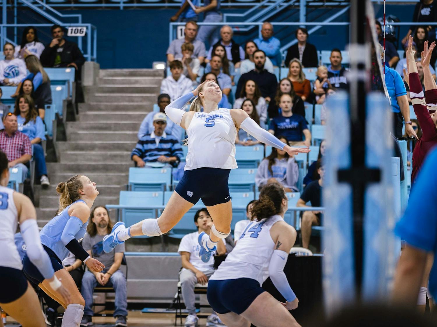 UNC graduate Charley Niego (5) spikes a ball early in the first set of the volleyball match against Boston College on Friday, Oct. 14, 2022. UNC beat Boston College 3-0.