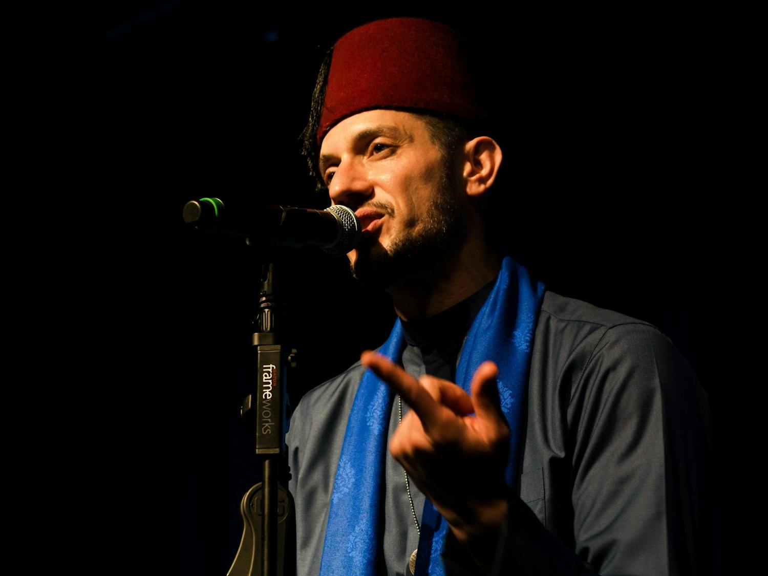 Omar Offendum, a Syrian-American hip-hop artist based in Los Angeles, performs at the UNC Center for Middle East and Islamic Studies 20th Anniversary Celebration on March 3, 2023. Photo Courtesy of Cemil Aydin.