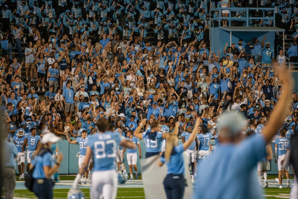 UNC fans celebrate a touchdown during the Tar Heels' home matchup in Kenan Memorial Stadium on Saturday, Sept. 11, 2021 against the Georgia State Panthers. The Tar Heels won 59-17.
