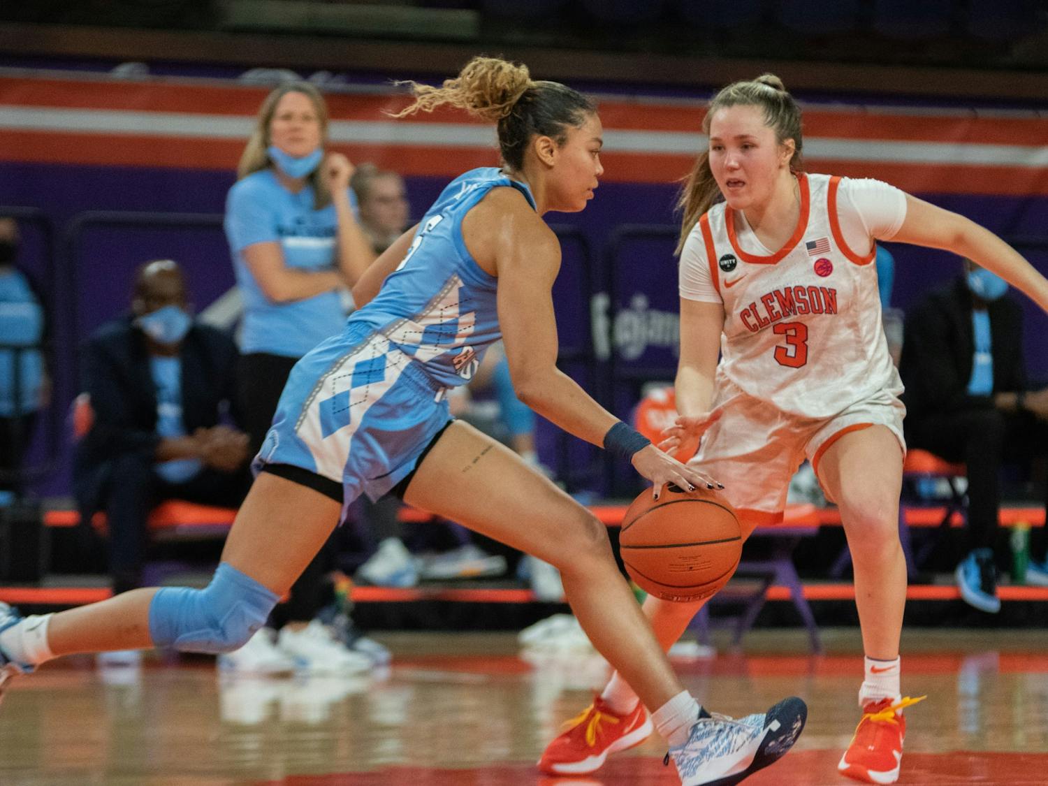 UNC graduate guard Stephanie Watts (5) dribbles downcourt during a game against Clemson on Feb. 18, 2021. UNC beat Clemson 77- 64. Photo courtesy of Caleb Browder. 