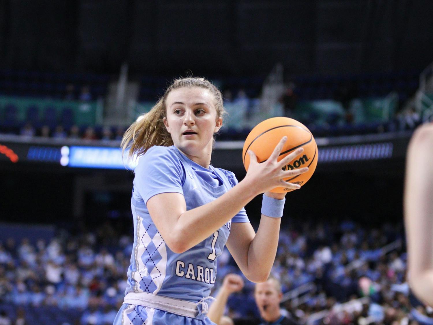 Sophomore guard Alyssa Ustby (1) looks for an open pass. UNC lost to South Carolina 61-69 in Greensboro on Friday, March 25, 2022, eliminating them from the NCAA tournament.