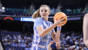 Sophomore guard Alyssa Ustby (1) looks for an open pass. UNC lost to South Carolina 61-69 in Greensboro on Friday, March 25, 2022, eliminating them from the NCAA tournament.