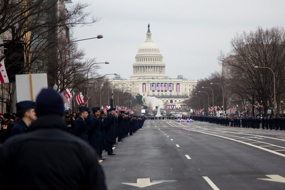 Consititution Avenue is cleared for the parade following Donald Trump's inauguration on Jan 21, 2017. The Capital Building is adorned with American flags.