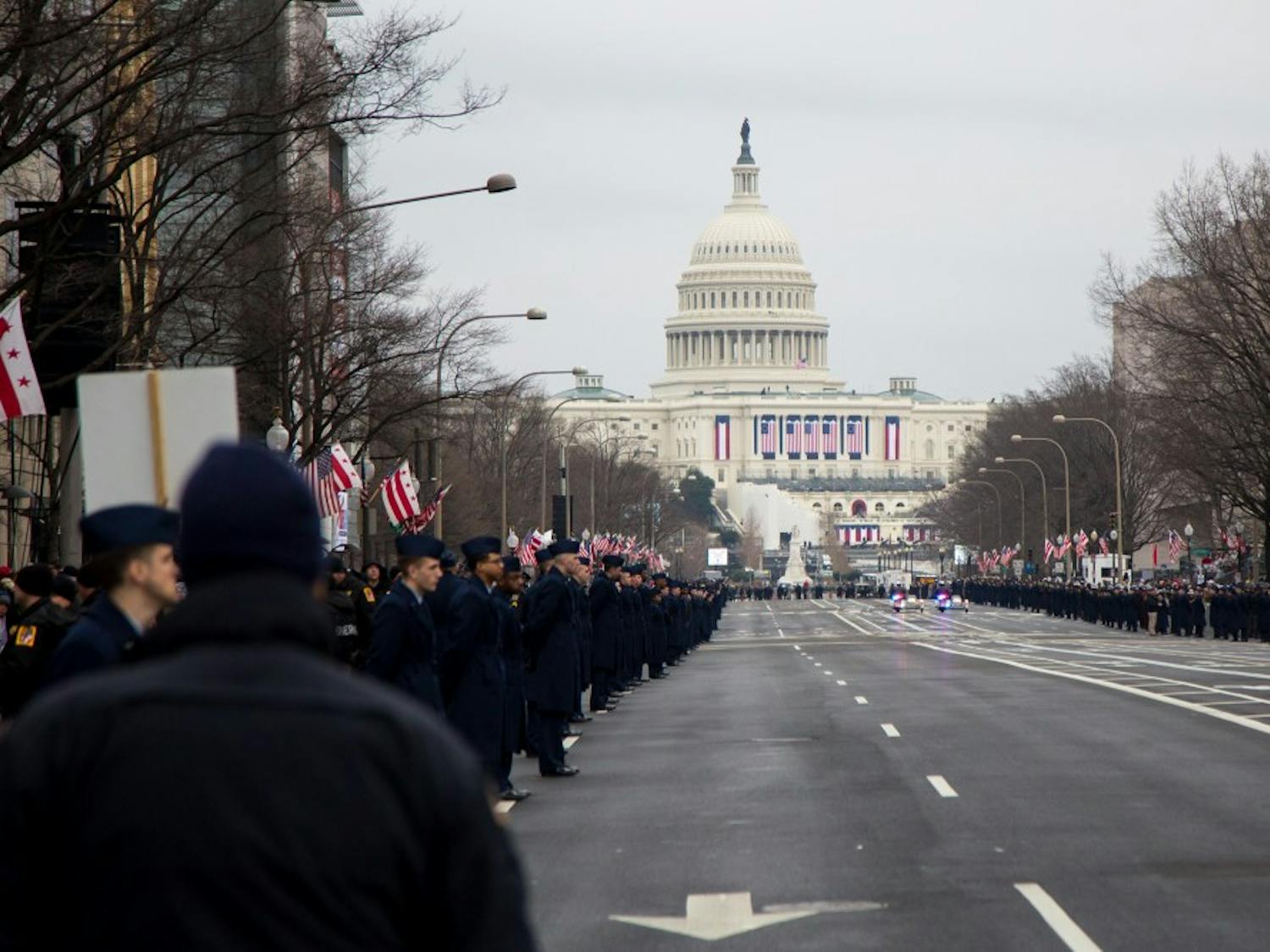 Consititution Avenue is cleared for the parade following Donald Trump's inauguration on Jan 21, 2017. The Capital Building is adorned with American flags.