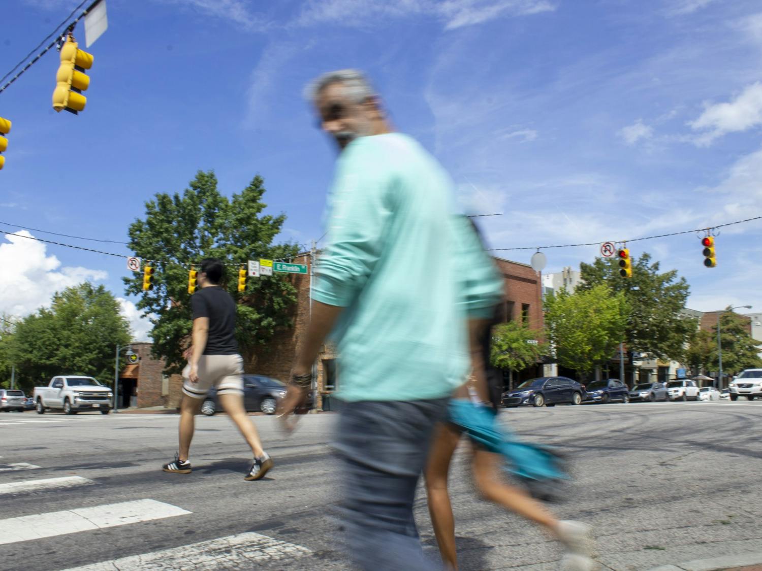 Pedestrians walk on Franklin Street in Chapel Hil, NC on September, 6 2022.
