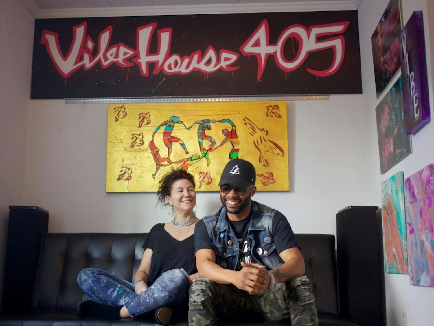 Co-owners Wendy Mann and Kevin "Kaze" Thomas sit in the gallery space at VibeHouse 405.