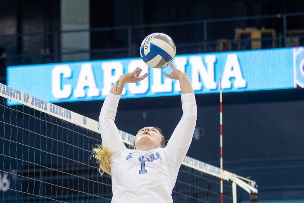 Graduate student setter Meghan Neelon (1) passes the ball during the game against Notre Dame on Nov 5 at Carmichael Arena. UNC lost in three sets.