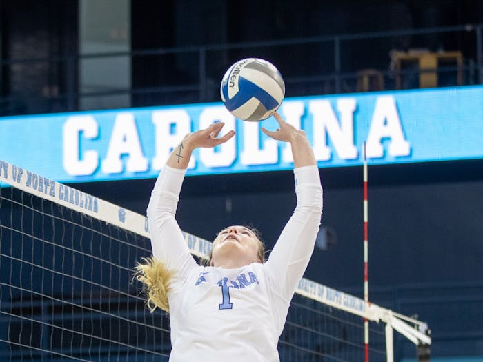 Graduate student setter Meghan Neelon (1) passes the ball during the game against Notre Dame on Nov 5 at Carmichael Arena. UNC lost in three sets.