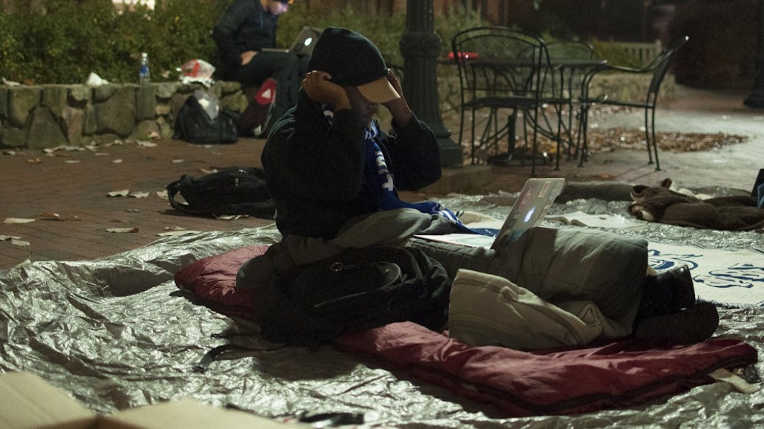 Frank Tillman, president of Phi Beta Sigma fraternity, sleep out for the homeless in the SASB Plaza taking donations for the homeless shelter on Franklin Street.