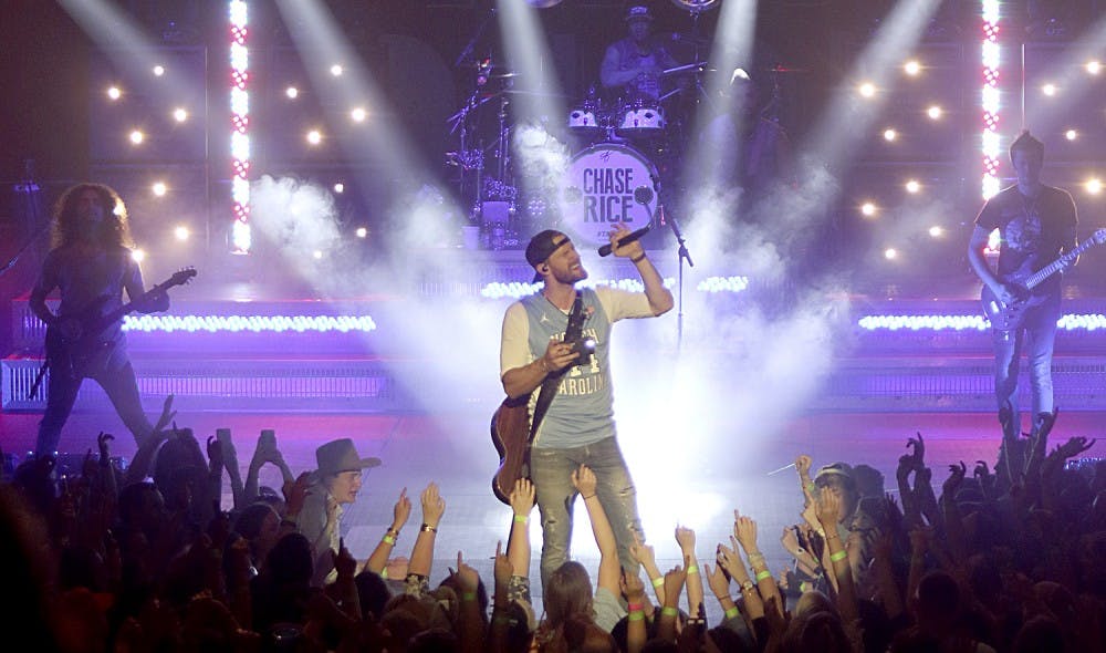 <p>Former UNC student and performer Chase Rice performs as a part of the&nbsp;2016 Jubilee hosted by the Carolina Union Activities Board. Rice performed in Carmichael Arena after the Spring Game.</p>