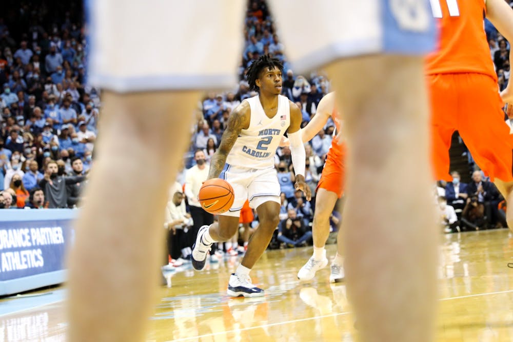 UNC sophomore guard Caleb Love (2) opens a possession during a men's basketball game against Syracuse on Monday, Feb. 28, 2022, at the Dean Smith Center. UNC won 88-79.