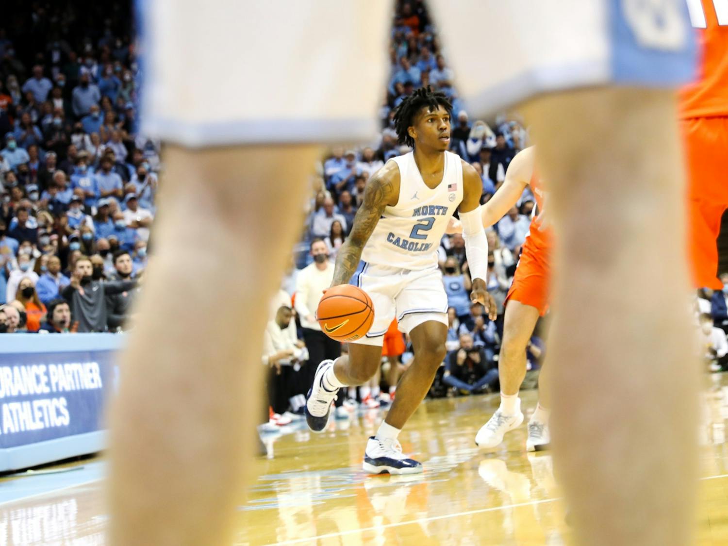 UNC sophomore guard Caleb Love (2) opens a possession during a men's basketball game against Syracuse on Monday, Feb. 28, 2022, at the Dean Smith Center. UNC won 88-79.
