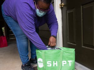 Delivery driver Daisy Otutuoloro prepares for a food delivery through Shipt in Raleigh, NC on Saturday, Aug. 29, 2020. Many unemployed workers in the Triangle have been turning to gig economy platforms such as these to supplement income lost due to the COVID-19 pandemic.