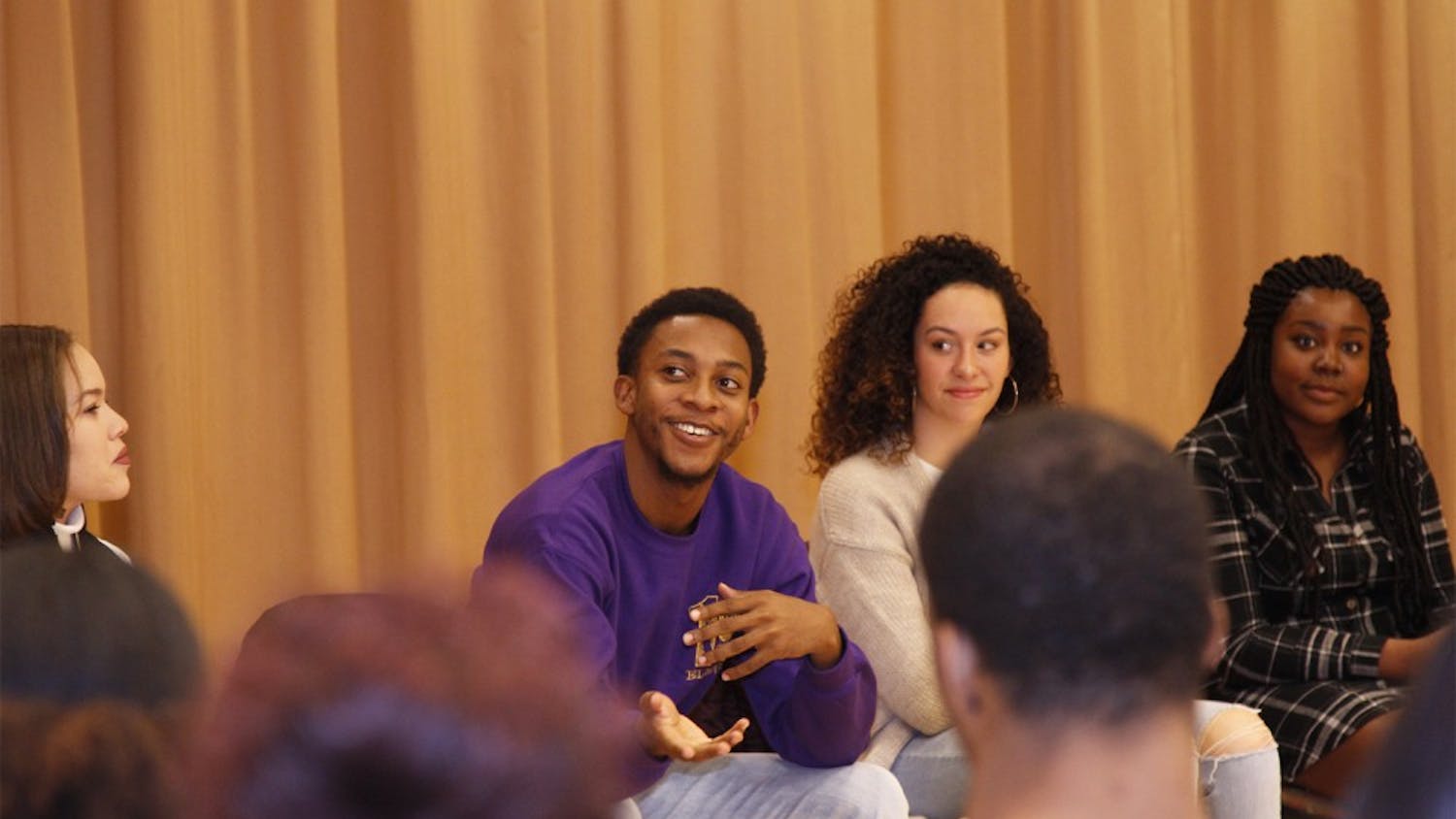 Senior Management & Society major Alex Neal joins four other panelists at a seminar organized by the Black Student Movement, called "The Double Standard", where they discussed interpersonal relationships, slut-shaming, and fidelity in monogamous relationships.