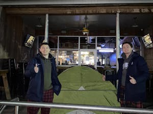 Will Palazzolo and Anders Hartmark were two of many North Carolina men's basketball fans who camped outside of Sup Dogs into the morning of Wednesday, March 30, 2022 to secure a reservation for the Final Four game. Photo courtesy of Will Palazzolo.