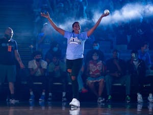Sophomore guard Deja Kelly (25) enters the court at Carolina Basketball Late Night on Oct. 15 at the Dean E. Smith Center.