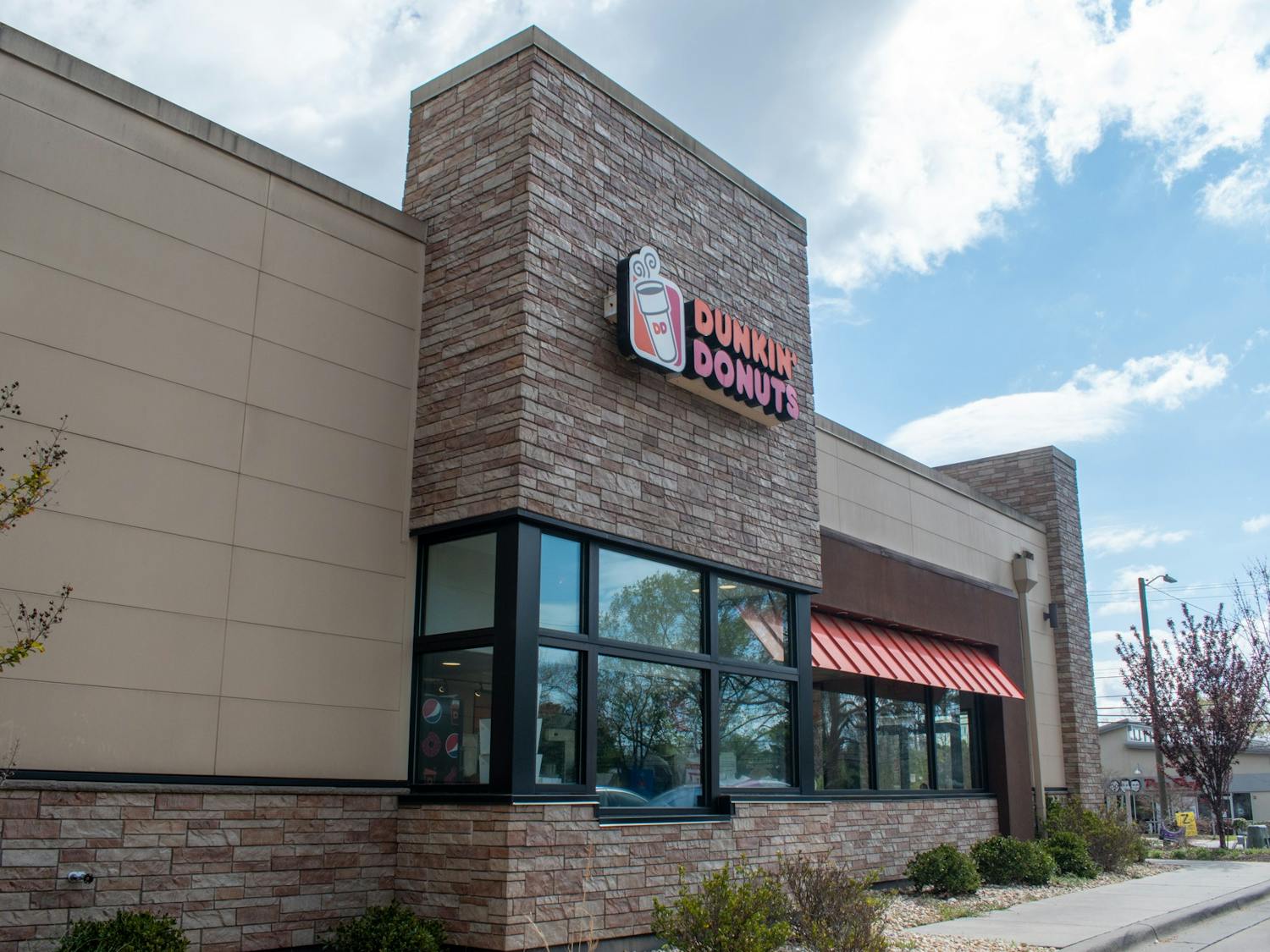 Dunkin’ Donuts sits on East Franklin Street on Wednesday, March 29, 2023.