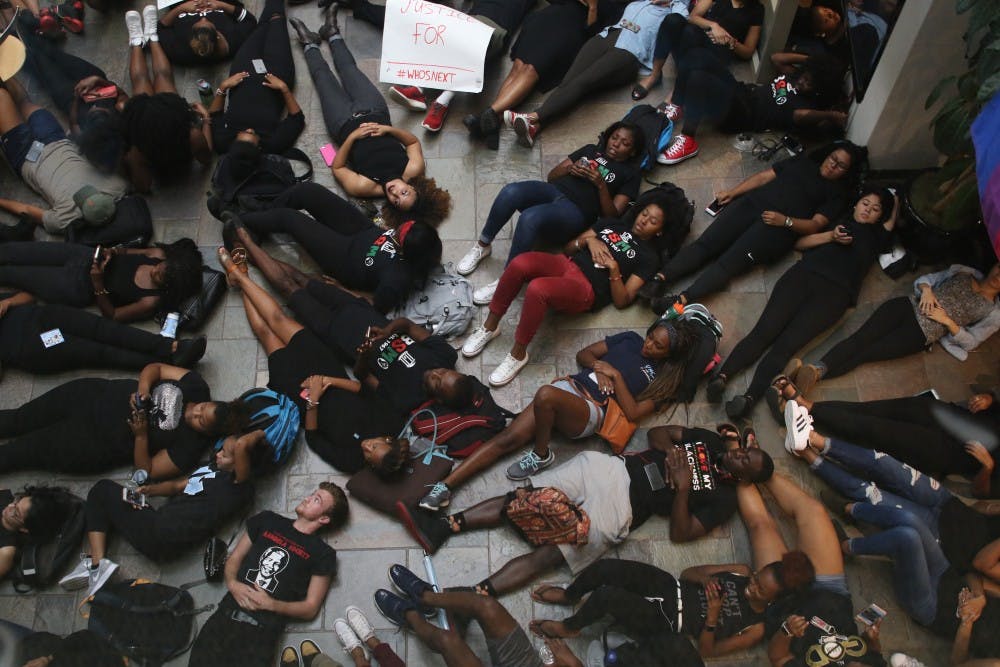Students staged a die-in in the Student Union today in response to the demonstrations going on in Charlotte.