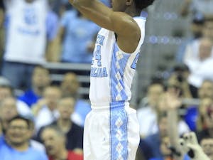 North Carolina's Kenny Williams (24) hits a three-pointer during the second half of the quarterfinals of the 2016 New York Life ACC Tournament on Thursday, March 10, 2016, at the Verizon Center in Washington, D.C. (Ethan Hyman/Raleigh News & Observer/TNS)