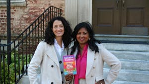 Professors Dr. Viji Sathy and Dr. Kelly Hogan showcase their new book on inclusive teaching outside of the Old Well on Wednesday, Oct. 4, 2022.&nbsp;