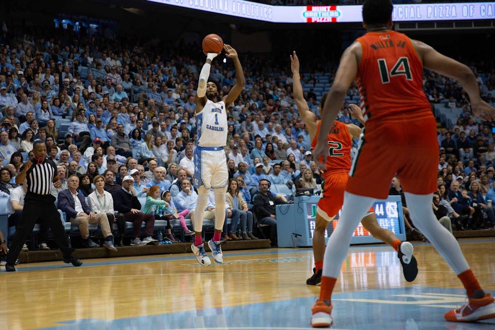 <p>Sophomore guard, Leaky Black (1) attempts a three-pointer during the first half against Miami on Saturday, Jan. 25, 2020 at the Smith Center. UNC leads 51-27.</p>