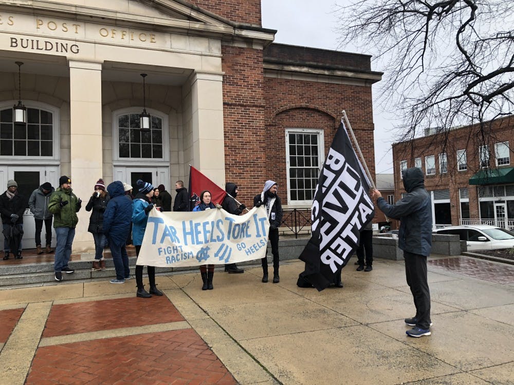 <p>Student activists gathered early Sunday to counter protest a planned Silent Sam demonstration by Heirs to the Confederacy. The group never showed, but a few dozen students were present at the event.</p>
