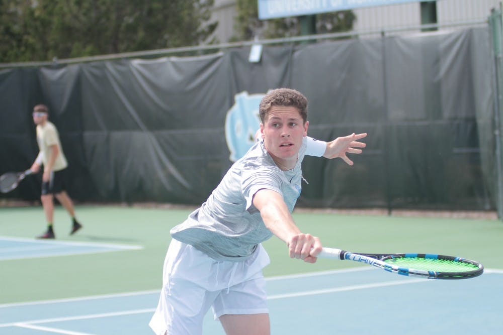 <p>Junior Blaine Boyden competes against Wake Forest on March 28 at the Cone-Kenfield Tennis Center.</p>