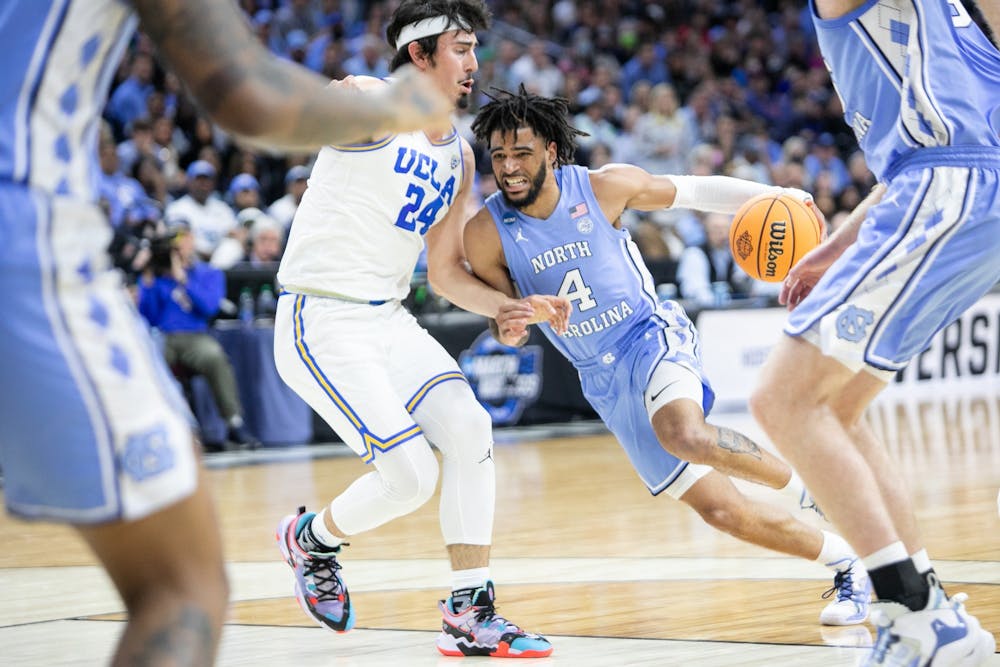 UNC sophomore guard RJ Davis (4) drives to the paint during the regional semifinals of the NCAA Tournament against UCLA in Philadelphia, Penn., on Friday, March 25, 2022.