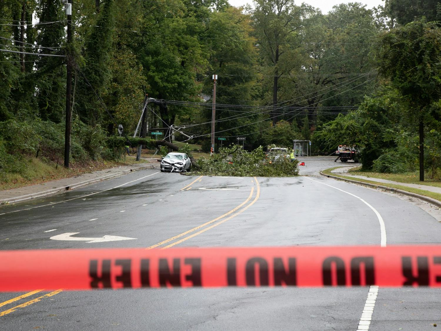 A fallen tree blocks South Columbia St. near Westwood Dr. on Saturday, Oct. 1, 2022, the day after Hurricane Ian made its way through Chapel Hill.