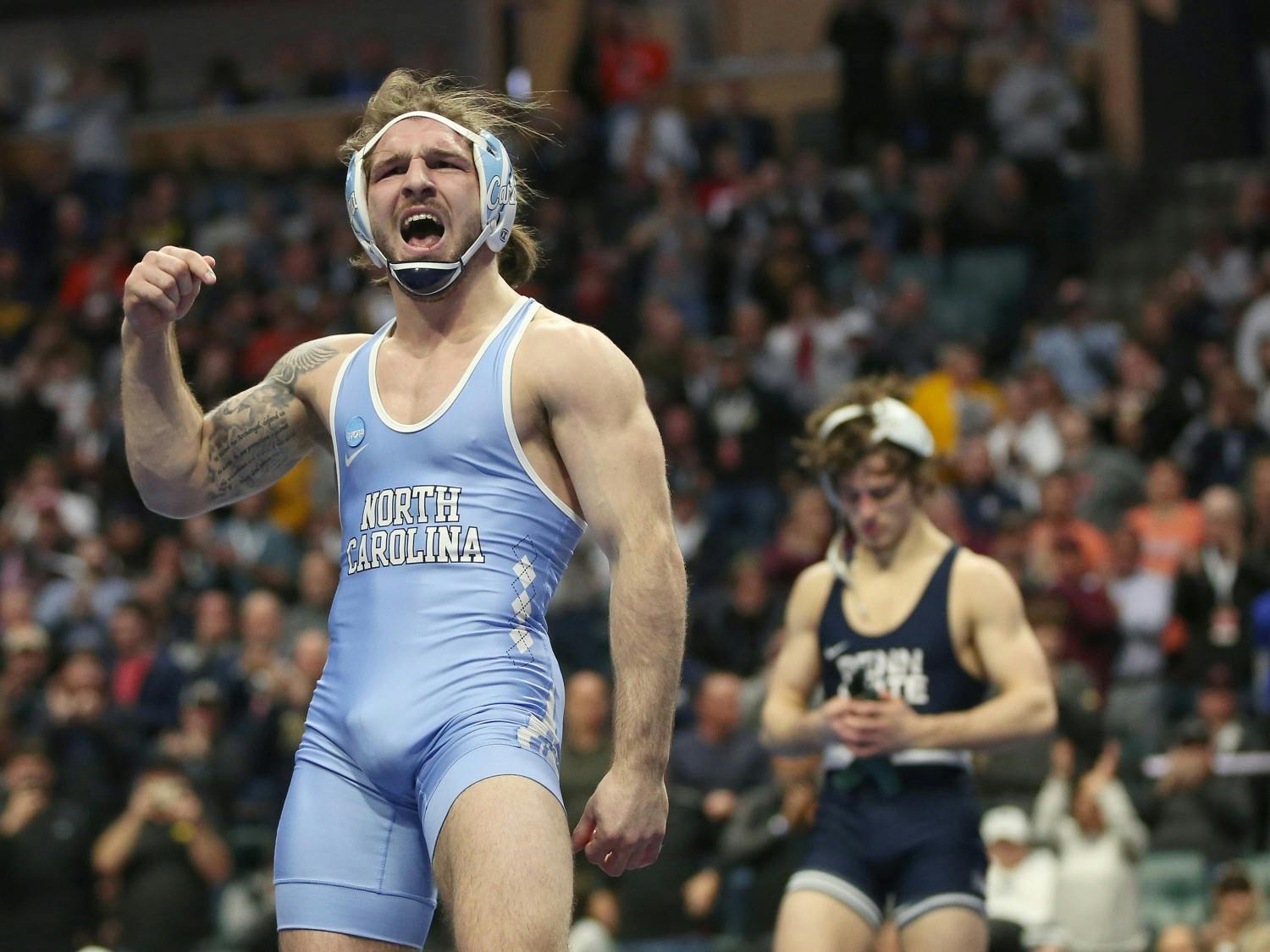 Austin O'Connor celebrates during his 157-pound national championship match against Levi Haines of Penn State. O'Connor defeated Haines 6-2. Photo Courtesy of Dave Crenshaw and UNC Athletic Communications.&nbsp;