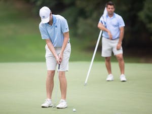 Ryan Burnett putts in the green at the Rod Myers Invitational at the Duke University Golf Club on Sunday, September 15, 2019.&nbsp;
