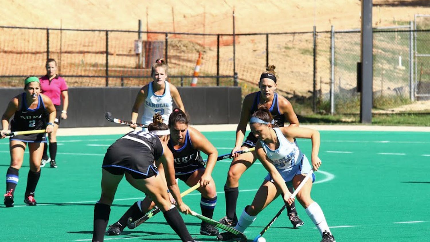 Gab Major (27) attempts to get the ball away from Duke defenders. The Tar Heels fell to Duke 3-0.&nbsp;