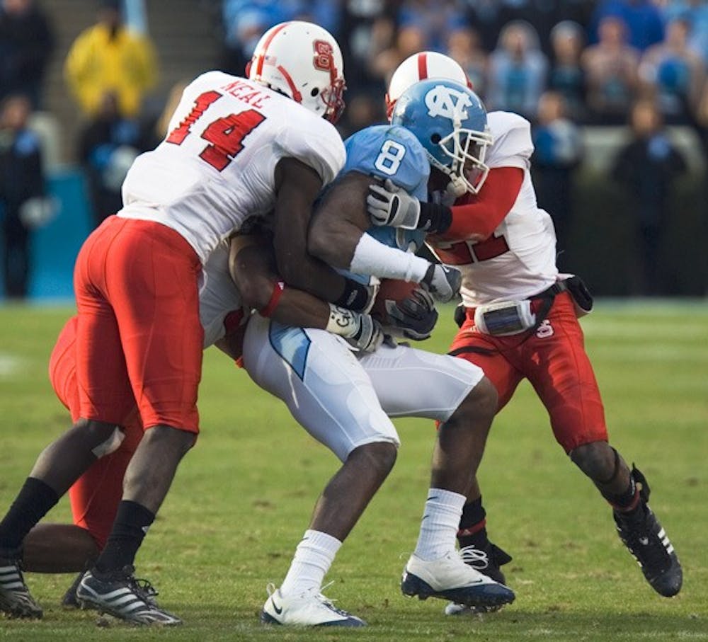 Greg Little (8) and the Tar Heels didn’t get much offensive production last season when UNC fell to the Wolfpack 41-10. DTH ile