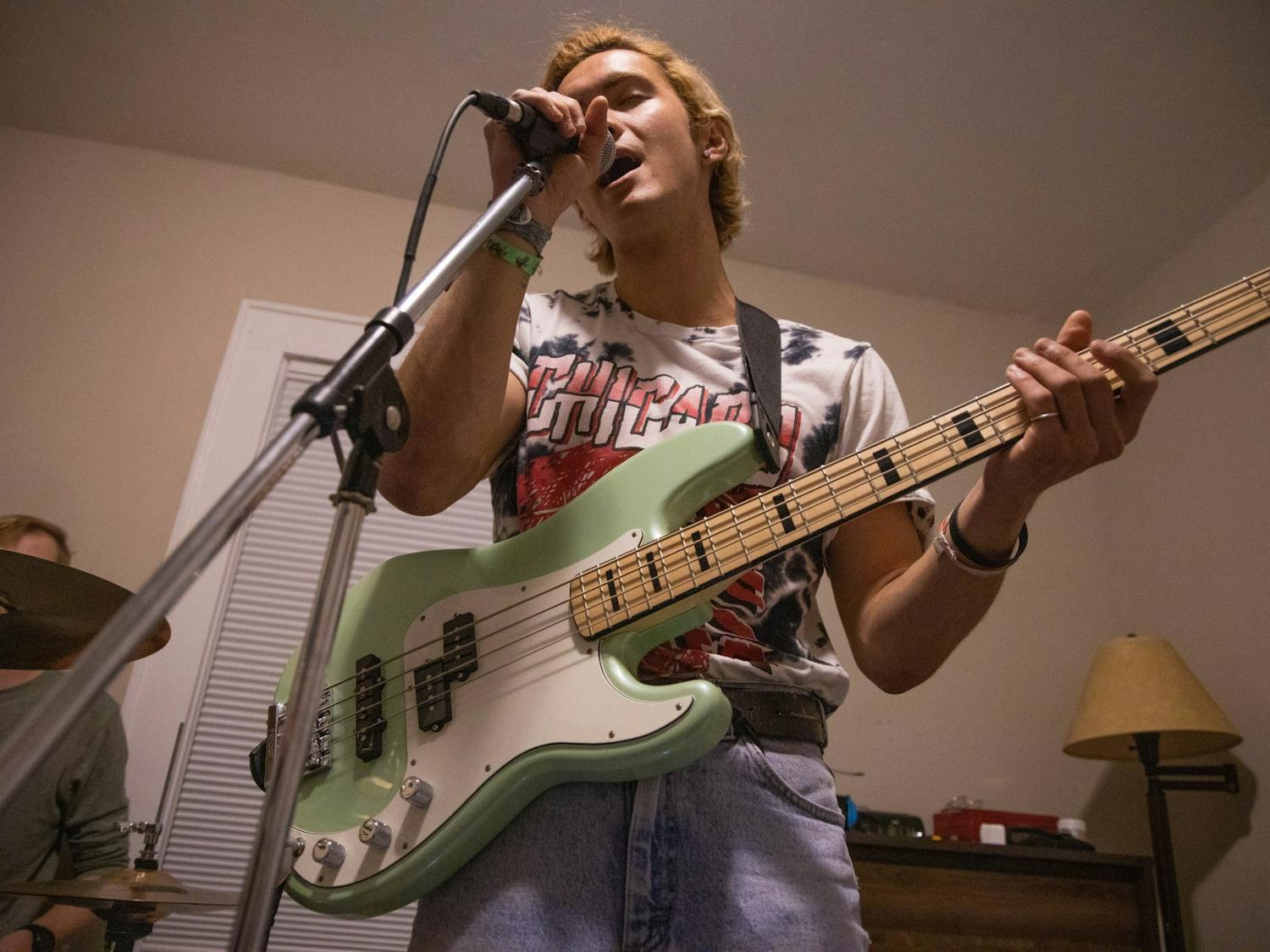Nick Trombetta, bassist for Flesh Tuxedo, practices with his band on Friday, Nov. 8, 2019. Flesh Tuxedo is just one of three bands in which Trombetta plays, the others named Madam! Madam! and Screen Time.