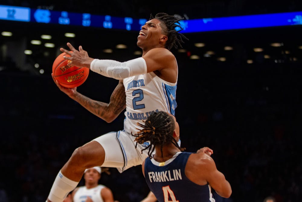 Sophomore guard Caleb Love (2) prepares to dunk the ball at the quarterfinals of the ACC men's basketball tournament against UVA at the Barclays Center on March 10, 2022. UNC won 63-43 and will be moving on to the semifinals.