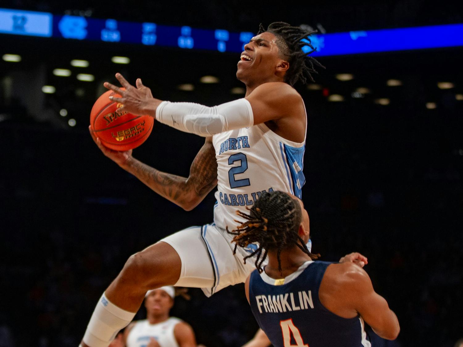Sophomore guard Caleb Love (2) prepares to dunk the ball at the quarterfinals of the ACC men's basketball tournament against UVA at the Barclays Center on March 10, 2022. UNC won 63-43 and will be moving on to the semifinals.
