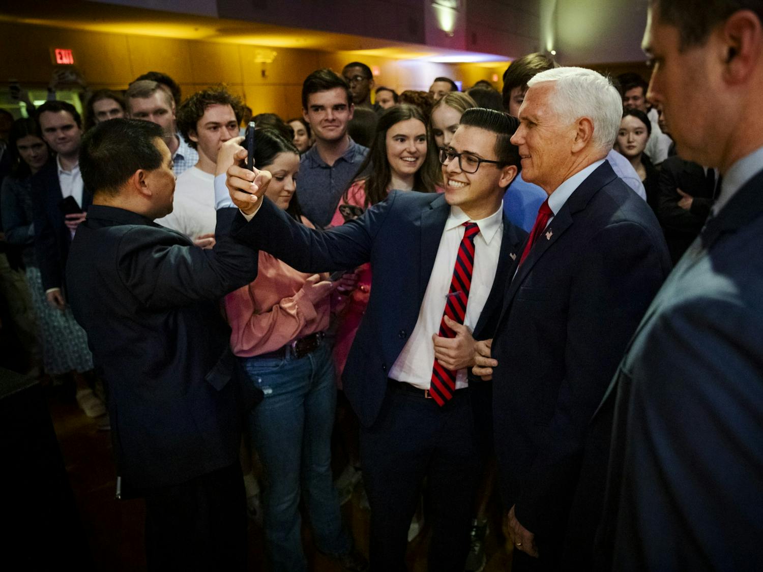 Students take selfies with Mike Pence, former vice president of the United States, after Pence delivered a speech on UNC's campus on Wednesday, April 26, 2023. Pence was hosted by the UNC College Republicans in an event called "Saving America from the Woke Left."