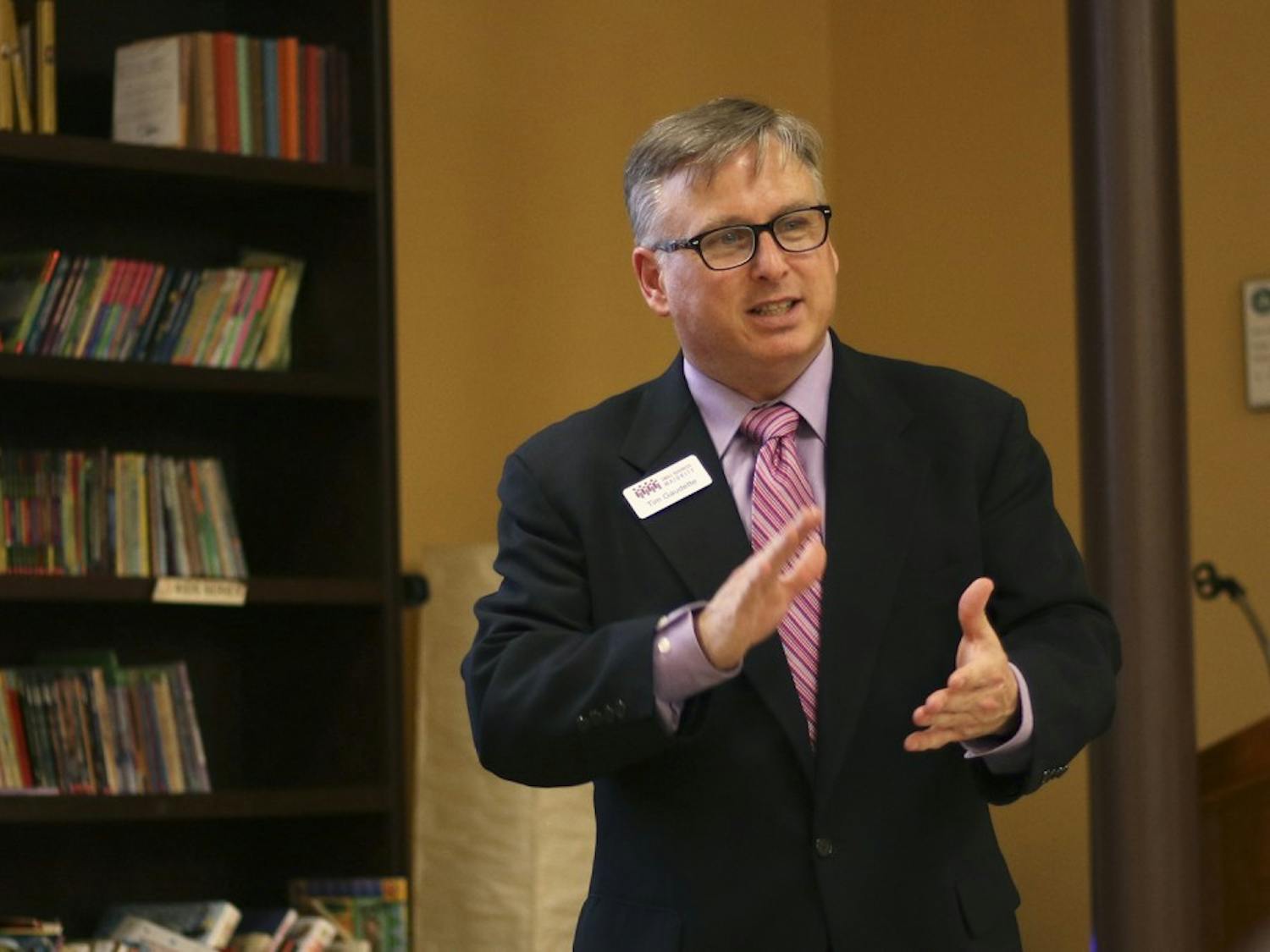 Tim Gaudette, an outreach manager of Small Business Majority, gave a presentation to a round-table of Chapel Hill and Carrboro small business owners at Flyleaf Books.