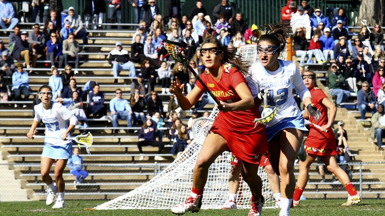 Sammy Jo Tracy (13) defends against a Maryland player Saturday afternoon. 
