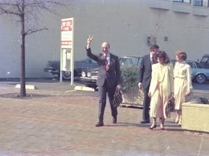 Walter Hussman Jr. walks out of a Little Rock, Arkansas, courthouse in March 1986 after being exonerated by a federal jury of all charges alleging predatory business practices in an antitrust lawsuit by his rival newspaper. Photo courtesy of Walter Hussman Jr.