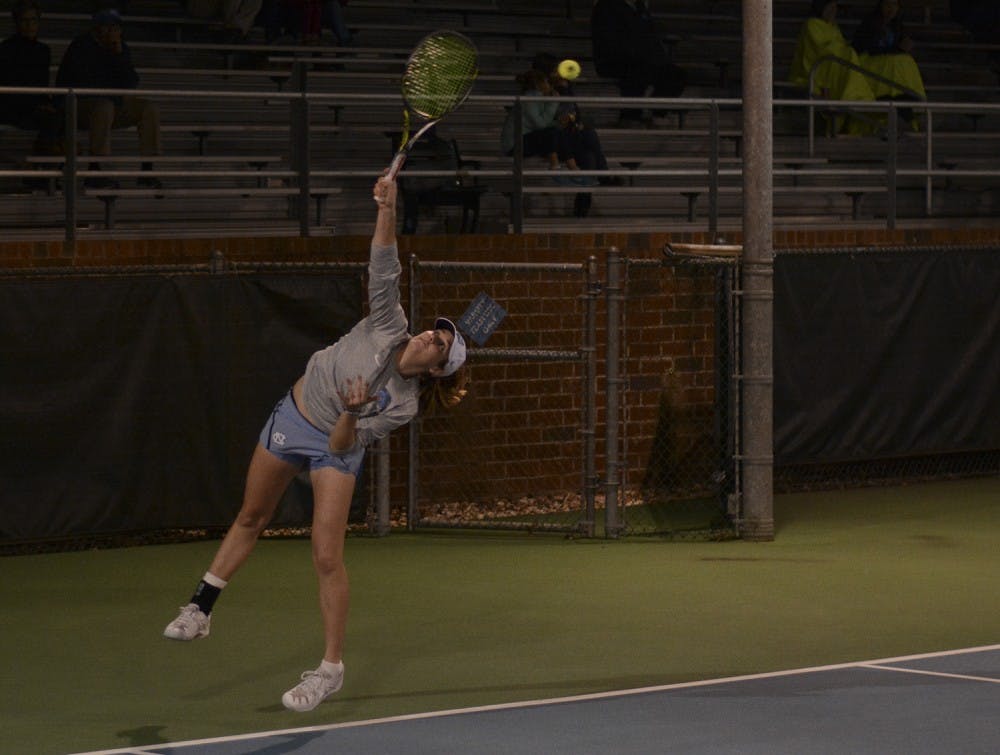 Hayley Carter serves in a #1 ranked singles match against Appalachian State. 